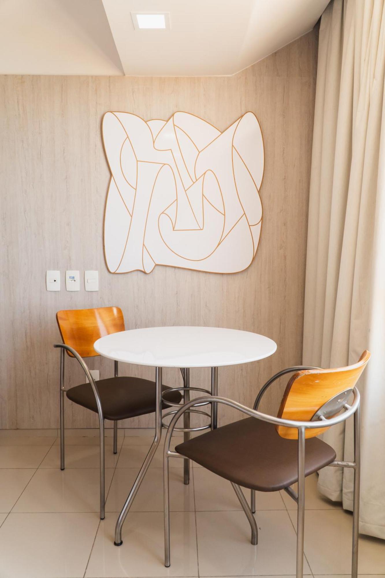 Seara Praia Hotel Fortaleza  Exteriér fotografie A table and two chairs